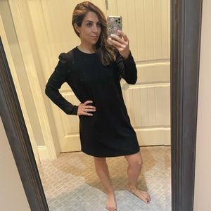 Cute black dress. Long sleeve.  Slight puff sleeve.